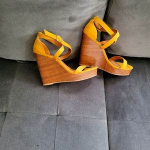 11 Mustard yellow wedge heel.  Never worn